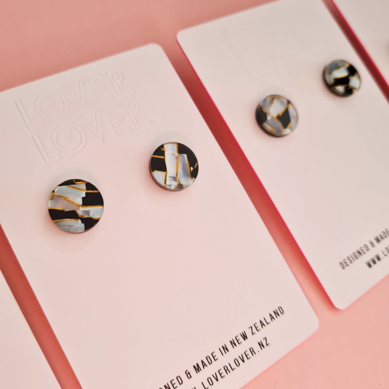 Small  round Ally Stud earring in pearlescent monochrome tones