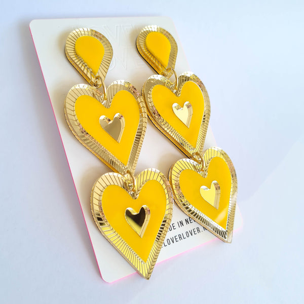 Heart shaped double drop Statement earring, Etched details in Gold Mirror. Marigold, Gold mirror in colour, medium to large in size light weight on your ears.