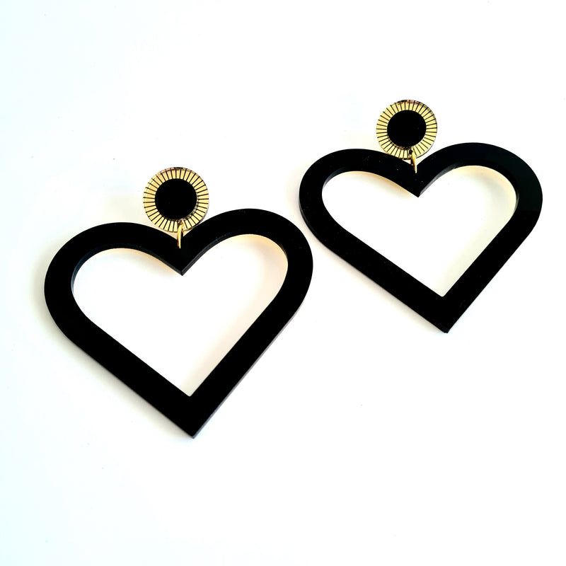 Bold Heart shaped Statement earring with etched Gold mirror detail. Black and Gold in colour. Large in size but light and comfortable on your ear. 